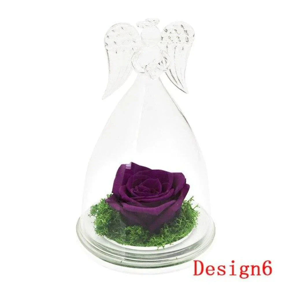 Preserved purple rose in glass dome with angel wings, on wooden base.  Lasts 3-5 years.