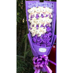 Adorable purple rose teddy bear bouquet; perfect gift for birthdays, anniversaries, or Valentine's Day.  Features plush bears & artificial roses.