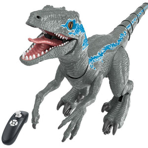 Grey remote control Velociraptor dinosaur toy; walks, roars, breathes smoke; LED lights; 26cm x 65cm.