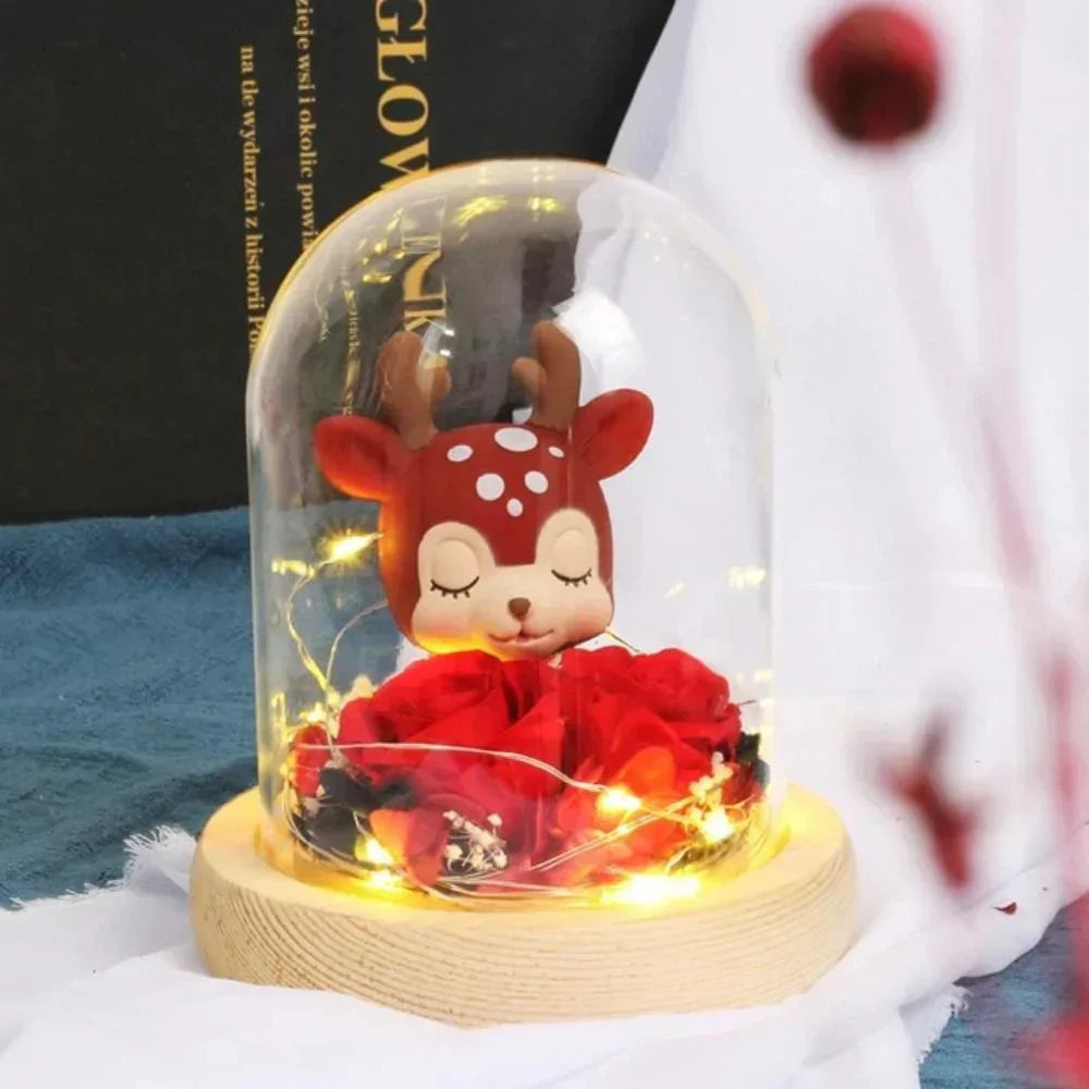 Red rose and deer figurine LED display in glass dome; charming gift, warm light.