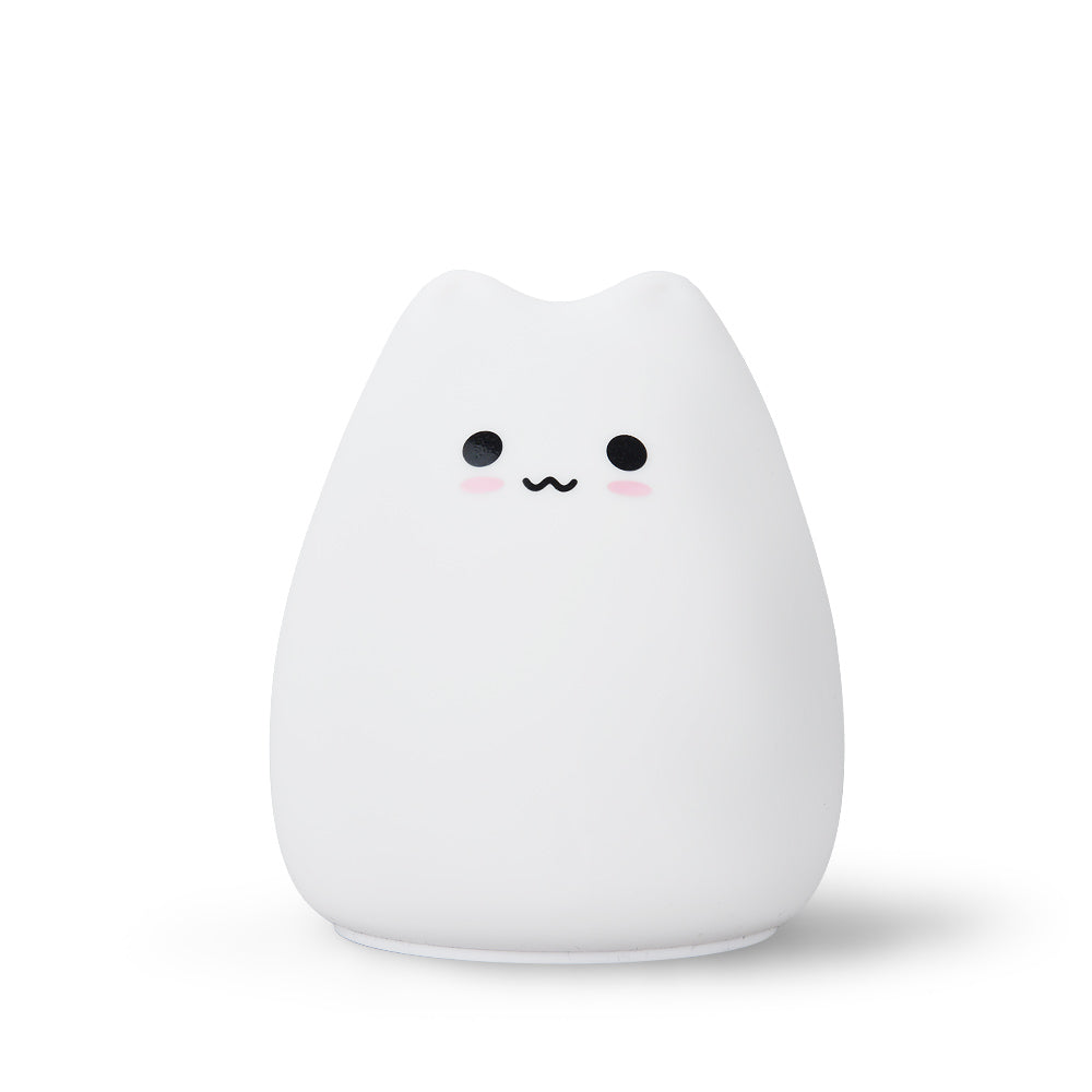 Adorable white silicone cat night light with color-changing LED, three cute designs. Soft, calming ambiance for bedrooms.