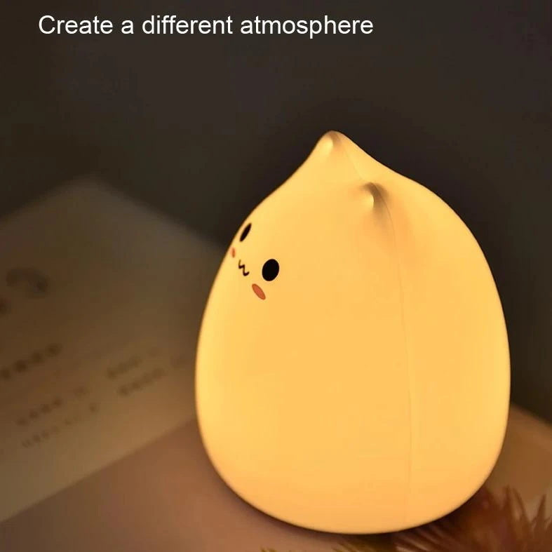 Adorable silicone cat night light, color-changing LED, three cute designs: Lovely, Smiling, Clever. Soft, portable, perfect for bedrooms.