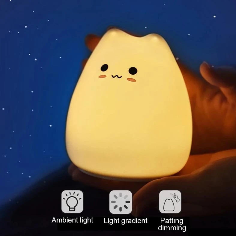 Adorable silicone cat night light, color-changing LED, 3 cute designs. Soft, calming glow for bedrooms.