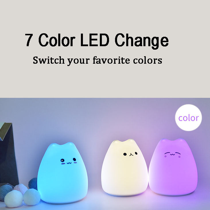 Adorable silicone cat night light, color-changing LED, 7 colors, 3 cute designs, soft & portable. Perfect for bedrooms.