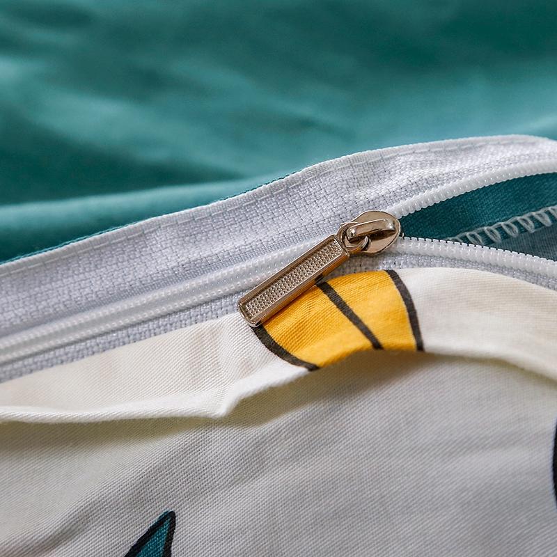 Reversible cactus floral bedding set in teal, yellow, and white microfiber. Soft, comfortable, and features a high-quality zipper.