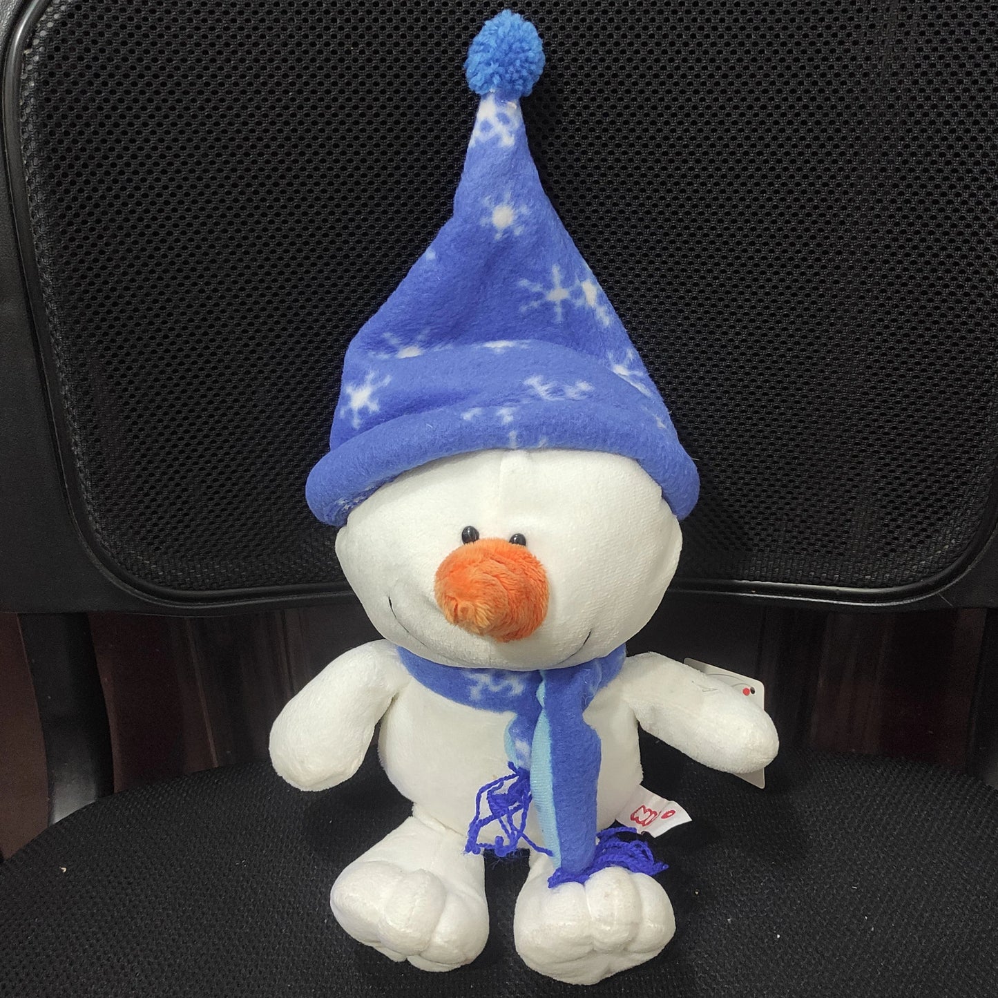 Embrace Winter Magic with the Snowman Plush Doll