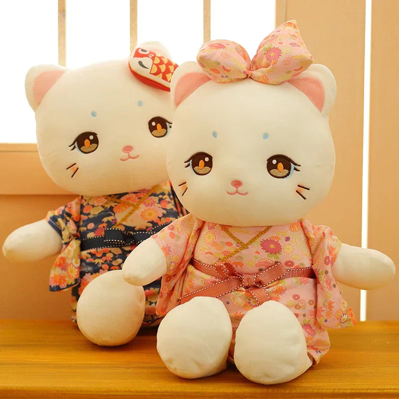 Adorable white cat plush wearing a pink floral kimono, filled with premium PP cotton.  Perfect for gifting or self-care.