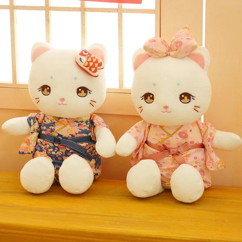 Adorable white cat plush toy wearing a floral Japanese kimono. Soft PP cotton filling, relaxing and allergy-friendly. Two sizes available.