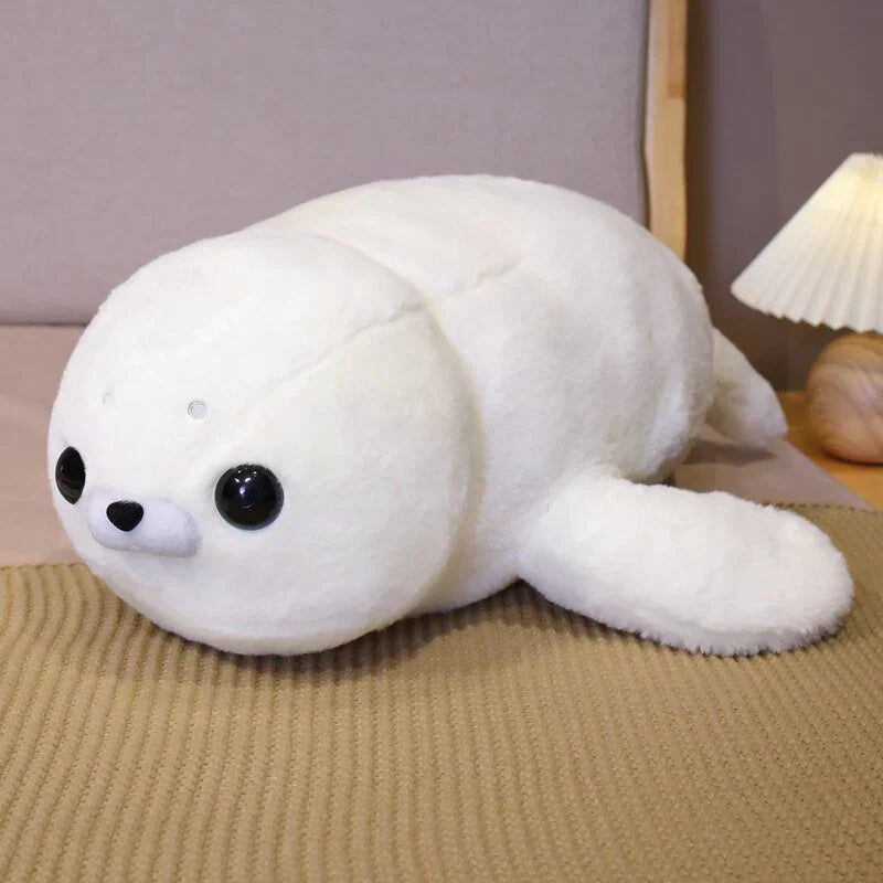 Adorable white fluffy seal plush toy, made with premium PP cotton, perfect for cuddling. Hypoallergenic & ethically sourced.