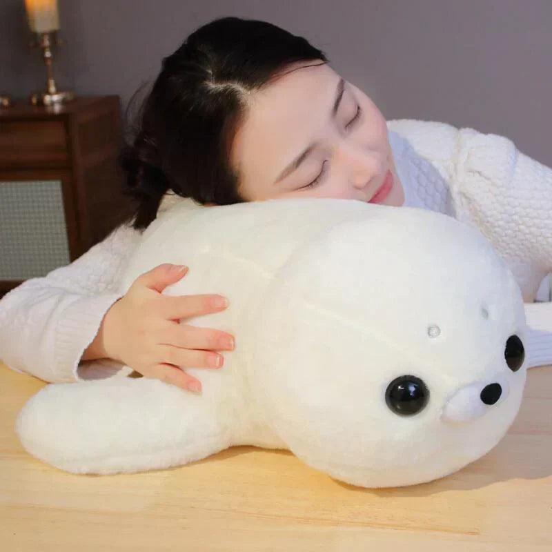 Adorable white fluffy seal plush toy, made of premium PP cotton, perfect for cuddling. Hypoallergenic & ethically sourced.