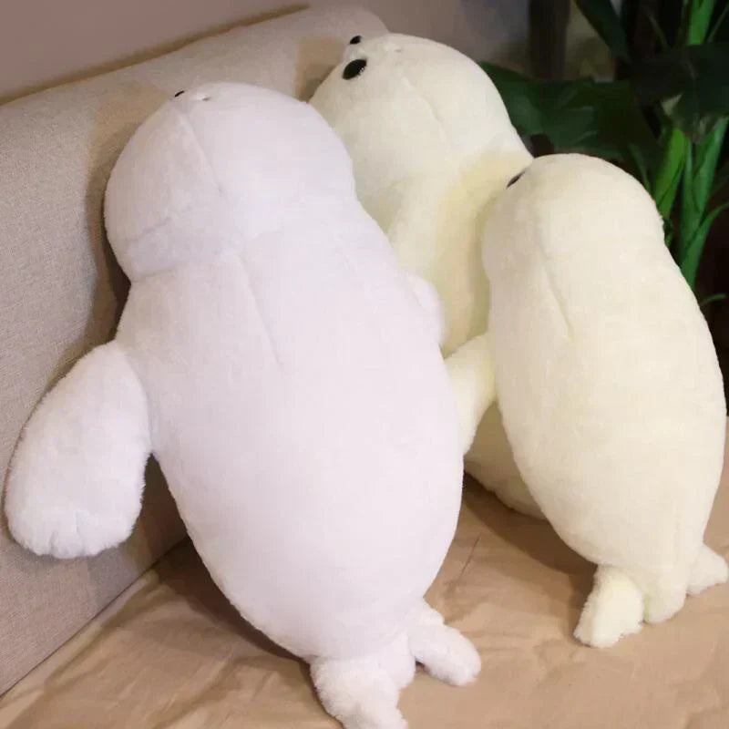 Adorable fluffy white seal plush toy, made of premium PP cotton, perfect for cuddling. Hypoallergenic & ethically sourced.