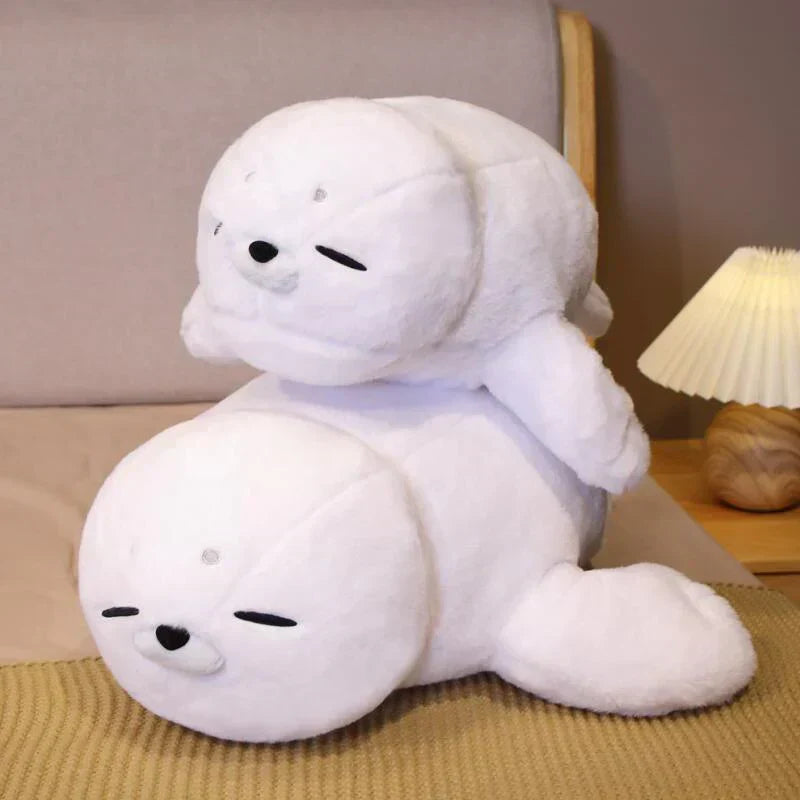 Adorable white fluffy seal plush toy, made of premium PP cotton, perfect for cuddling. Hypoallergenic and ethically sourced.