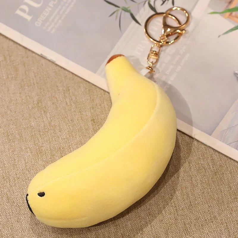 Cute yellow banana seal plush keychain, made of soft PP cotton.  Perfect gift!