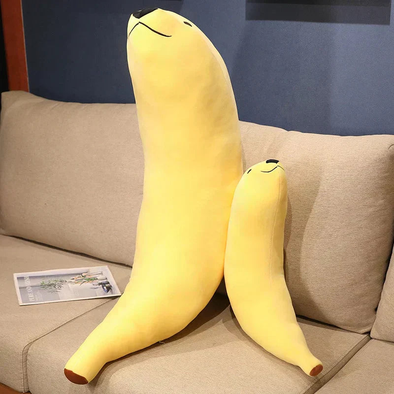 Adorable yellow banana-shaped seal plush toy, made of soft PP cotton.  Perfect for cuddling! Available in various sizes.