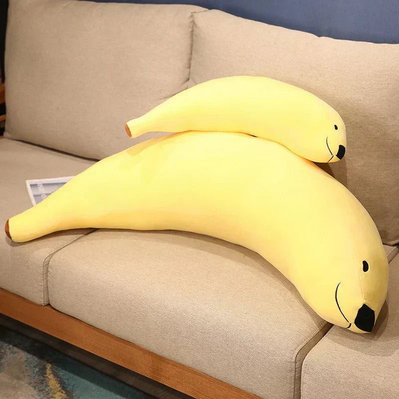 Adorable yellow banana seal plush toy, made of soft PP cotton, perfect for cuddling.  Available in various sizes.
