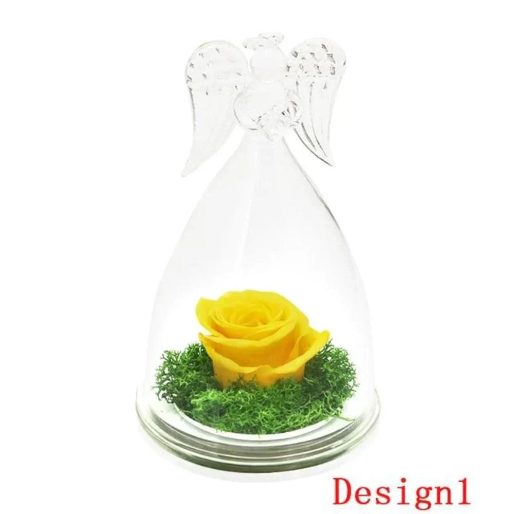 Preserved yellow rose encased in glass dome with angel wings, wooden base; 10x10x16cm or 12x12x12cm.  Lasts 3-5 years.