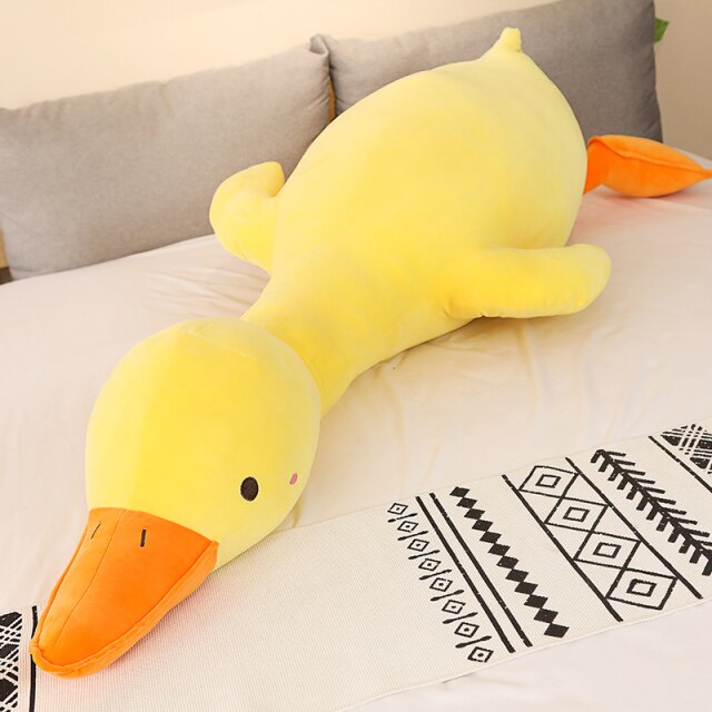 Large yellow plush swan pillow, soft PP cotton filling, hypoallergenic, promotes relaxation. Perfect gift!